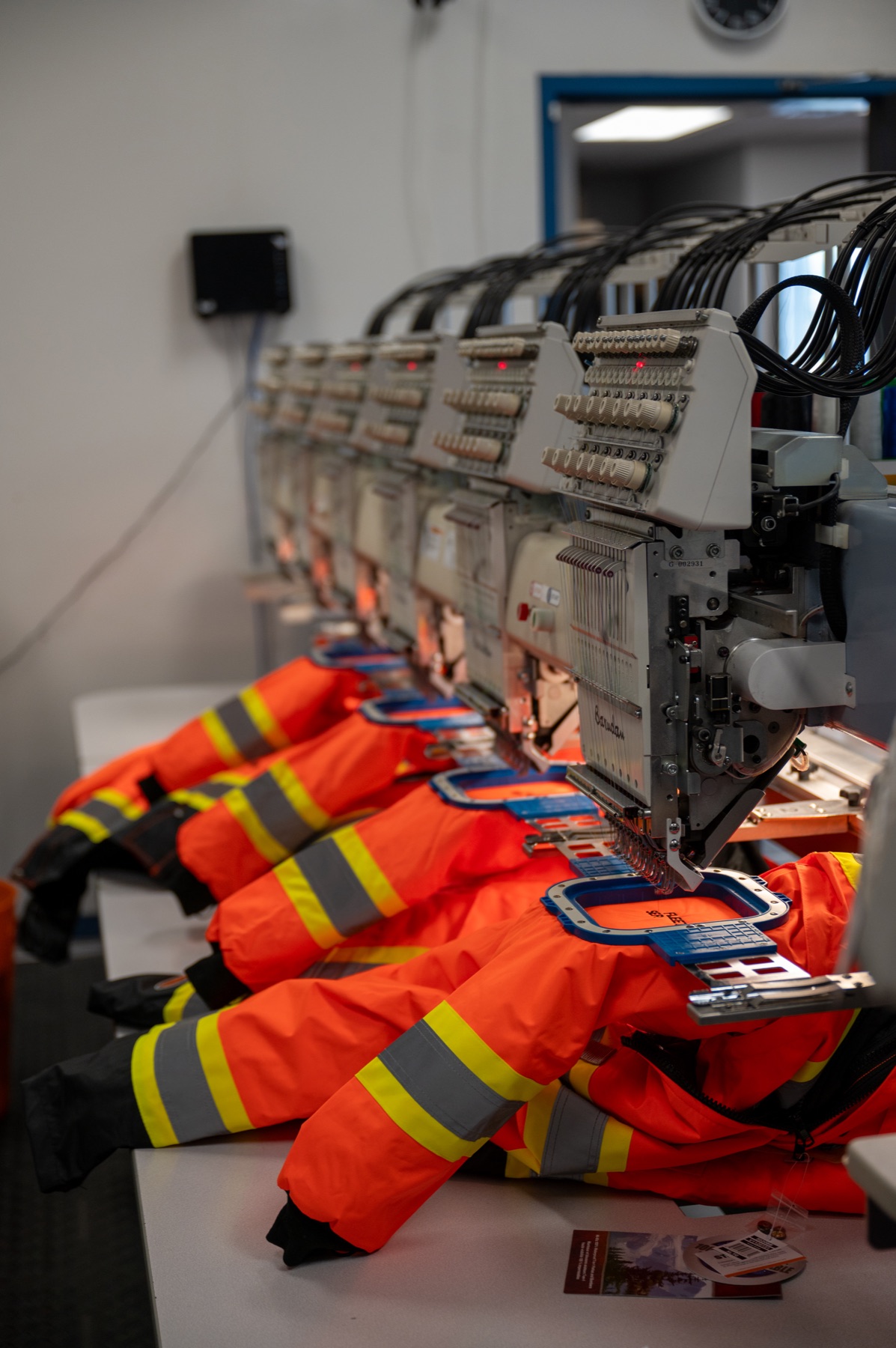 Industrial embroidery machines decorating apparel